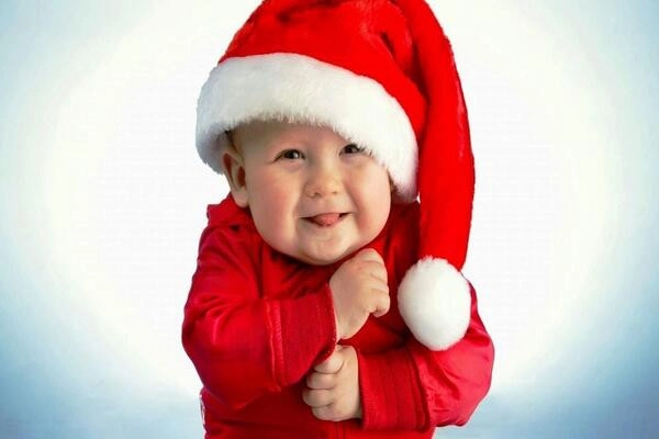 smiley-cute-baby-is-wearing-santa-claus-dress-and-cap-in-blue-background-cute-1-1642410653