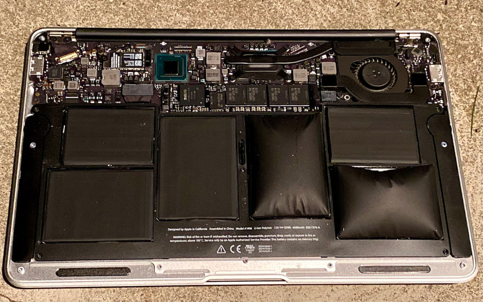 Pin Macbook bị phồng (phù) do sạc không đúng cách 
